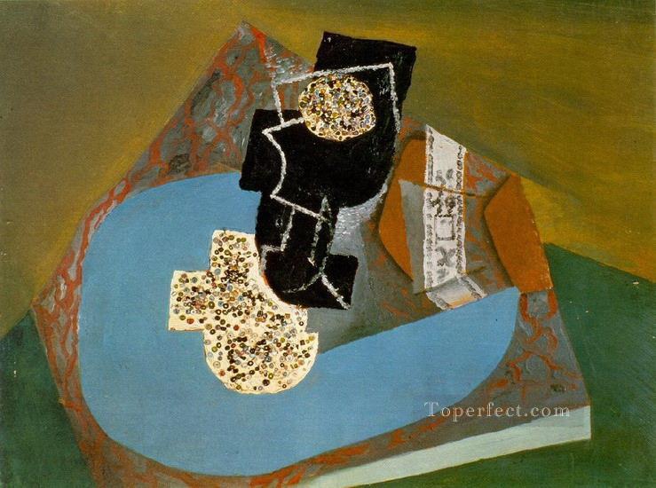 Glass and tobacco packet on a table 1914 cubist Pablo Picasso Oil Paintings